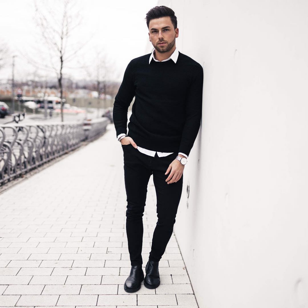 black jumper and white shirt