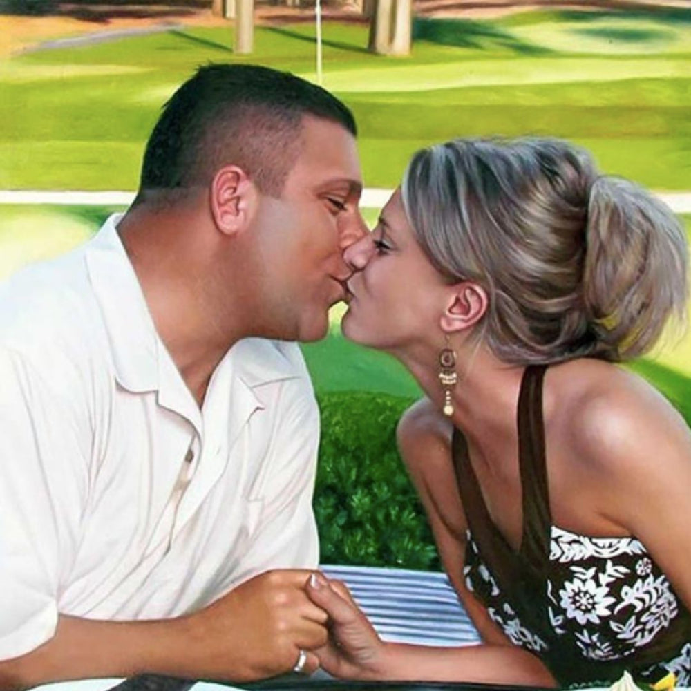 A hand-painted portrait of a couple kissing turned from a picture into a painting