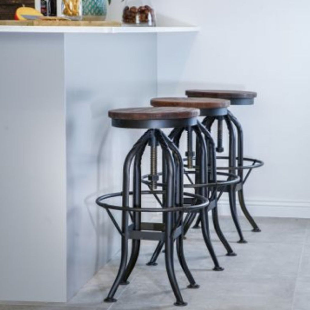 Although they might not be the first item your mind jumps to when you think of a well-designed, stylish home, bar stools can make a huge aesthetic impact to your space! They are the perfect piece to marry style and function in so many different areas of y