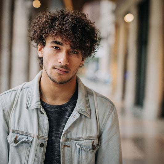 The Ultimate Guide to Elegant Hairstyles for Curly-Haired Men